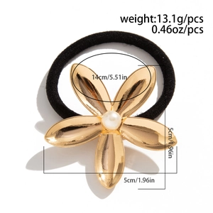 Detail of gold floral hair tie with faux pearl and technical measurement annotations