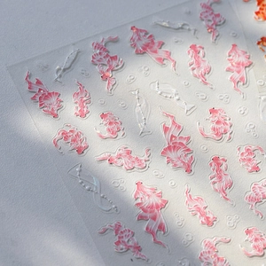 3D embossed koi fish nail art stickers with gold foil accents and pink gradient design