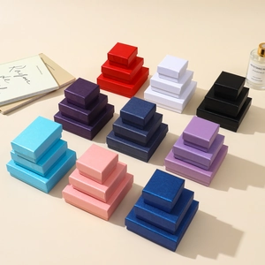 Multicolor jewelry gift boxes set in nine colors and three different sizes with paper texture