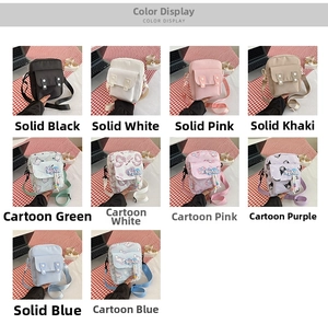 Detail view of colorful canvas crossbody bags with flap buckles and adjustable straps