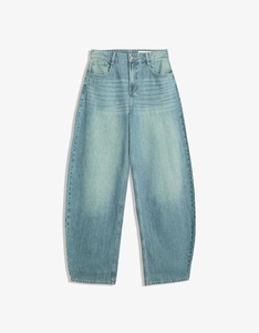 Detail shot of light blue high-waisted wide leg denim jeans with vintage wash and stitching