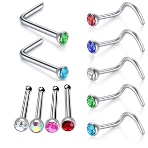 Detailed macro shot of F136 titanium nose studs with colorful 5A cubic zirconia stones