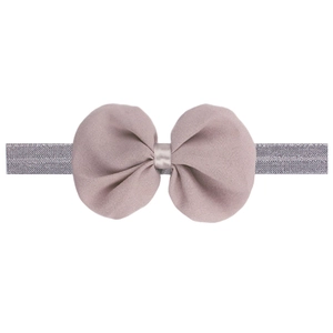 Close-up of Morandi pink chiffon bow on a grey elastic headband for newborn babies