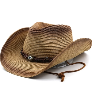 Handwoven straw cowboy hat with brown gradient, evil eye bead and adjustable chin strap