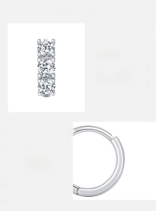 Macro detail of VVS1 Moissanite stone settings and S925 sterling silver hoop earrings