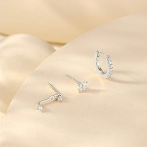 Detailed macro view of S925 sterling silver earring set with marquise cut cubic zirconia