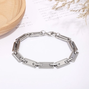 Macro view of geometric silver stainless steel rectangular link chain bracelet