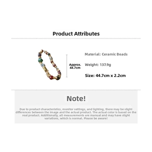 Macro shot of ethnic ceramic flower necklace showing 44.7cm length and material details