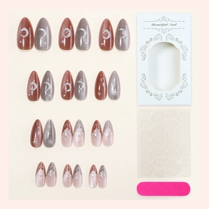 Maillard brown cat eye press-on nail kit with moon and star design in almond shape