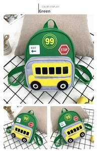Detail view of green children schoolbag with cartoon bus and stop sign prints