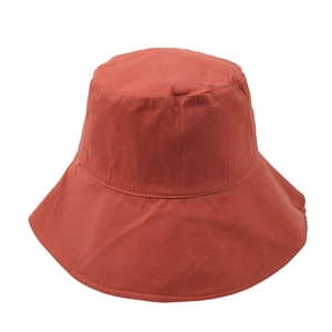 Caramel leopard reversible bucket hat for women showing solid color side and clean stitching