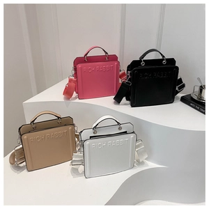 Four colors of minimalist square tote bags with embossed text and wide shoulder straps