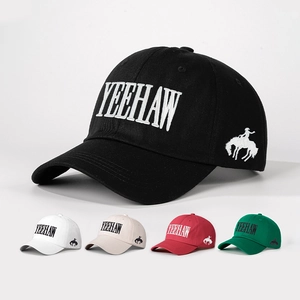 Close-up of YEEHAW embroidery and cowboy silhouette on 100% cotton baseball cap