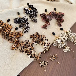 Leopard print fabric flower tassel drop earrings with black gemstones in four colors