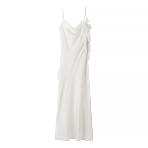 Elegant white satin maxi dress with backless design and decorative side bow detail