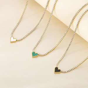 Elegant heart pendant necklace set in gold finish with vibrant colorful gemstones