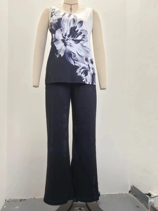 Detailed view of women's two-piece floral print sleeveless top and long pants set