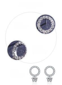 Macro detail of 925 sterling silver earrings with hand-set 5A cubic zirconia stones