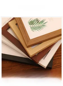 Close-up of modern wooden frames in various finishes like oak, black and white