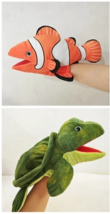 Detail of plush clownfish and green turtle hand puppets for kids interactive play