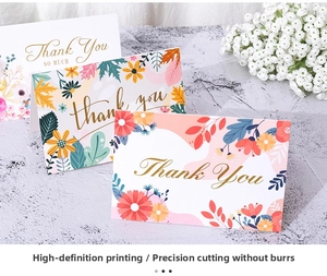 Floral and maple leaf thank you cards collection displayed on marble surface