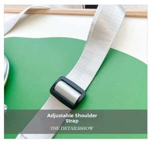 Detail showing adjustable high-density fiber shoulder strap with black buckle for kids bag