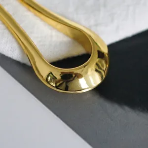 Minimalist gold-plated teardrop earrings with elegant streamlined geometric design for women