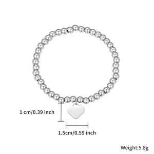 Minimalist silver bead bracelet with heart pendant and dimensions 1x1.5cm 5.8g