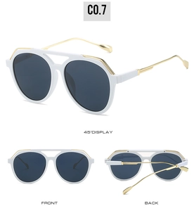 Detail view of retro aviator sunglasses with white acetate frame and gold metal temples