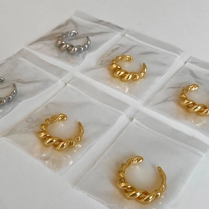 Minimalist twisted rope croissant open ring in polished gold and silver finish