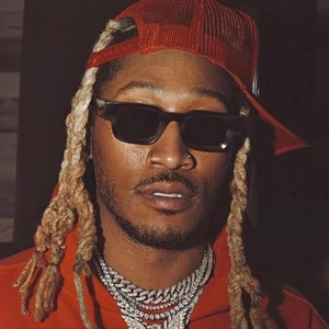 Fashion close-up of square sunglasses and chunky rhinestone Cuban link chains on a model
