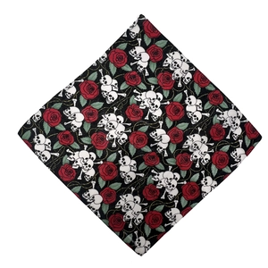 Cotton bandana featuring realistic red roses and white skulls in a gothic style