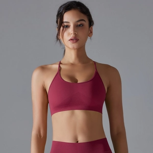 Seamless burgundy yoga set featuring a ribbed sports bra and high-waist leggings