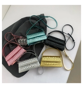Collection of metallic crocodile pattern mini bags in pink silver green black and gold