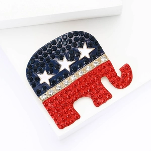 Elephant brooch with red white and blue crystals in American Republican style on white stand