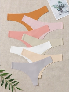 Flat lay view of seamless thong underwear in multiple Morandi colors and nude tones
