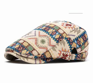 Detailed close-up of bohemian geometric jacquard pattern on a beige flat ivy cap