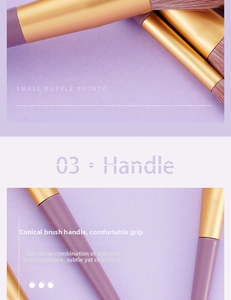 Detailed macro view of the tapered purple handle and champagne gold ferrule on makeup brush