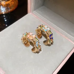 Elegant gold plated floral open ring with colorful enamel petals and zircon accents