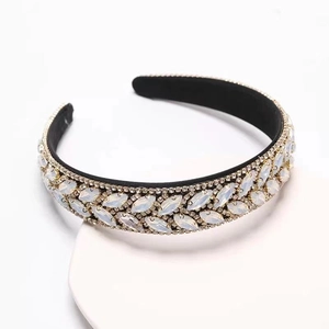 Close-up of rhinestone leaves and marquise gems on Baroque padded headband