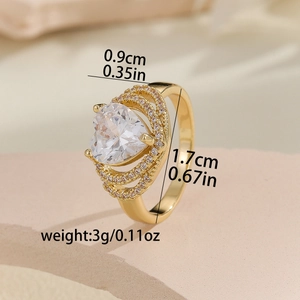 Luxurious gold heart-shaped zircon ring with crown-style sparkling stone accents