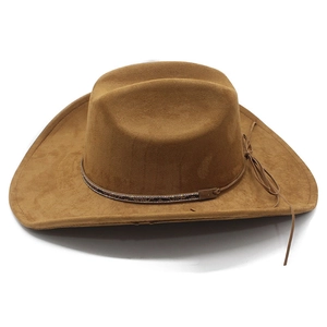 Detail of brown suede cowboy hat featuring an ethnic patterned band and side string knot