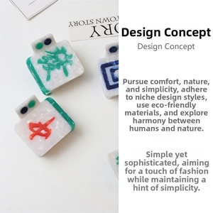 Close-up of creative mahjong hair claw clips with resin texture and Chinese characters