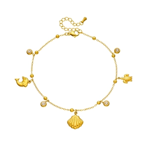 Gold stainless steel ocean anklet with dolphin, shell and turtle charms for women