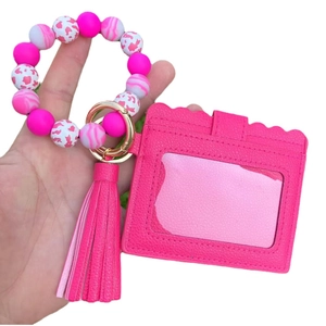 Pink silicone bead keychain bracelet with card holder and stylish PU leather tassel