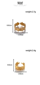 Detail view of gold adjustable rings with crown and feather textures including measurements