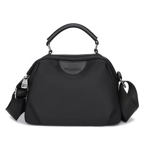 Waterproof black oxford cloth handbag with multiple layers and adjustable shoulder strap