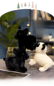Detailed view of plush black French bulldogs and pugs set in a cozy home scene with lights