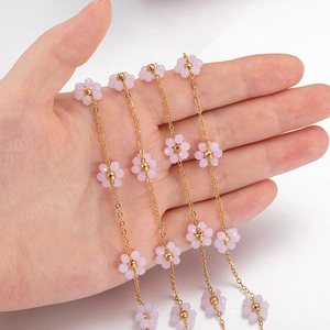 Handmade golden chain with pink crystal flowers for DIY jewelry making and bracelets