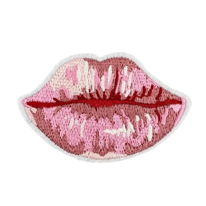 Lip shaped embroidery patch with red and pink thread textures on white background